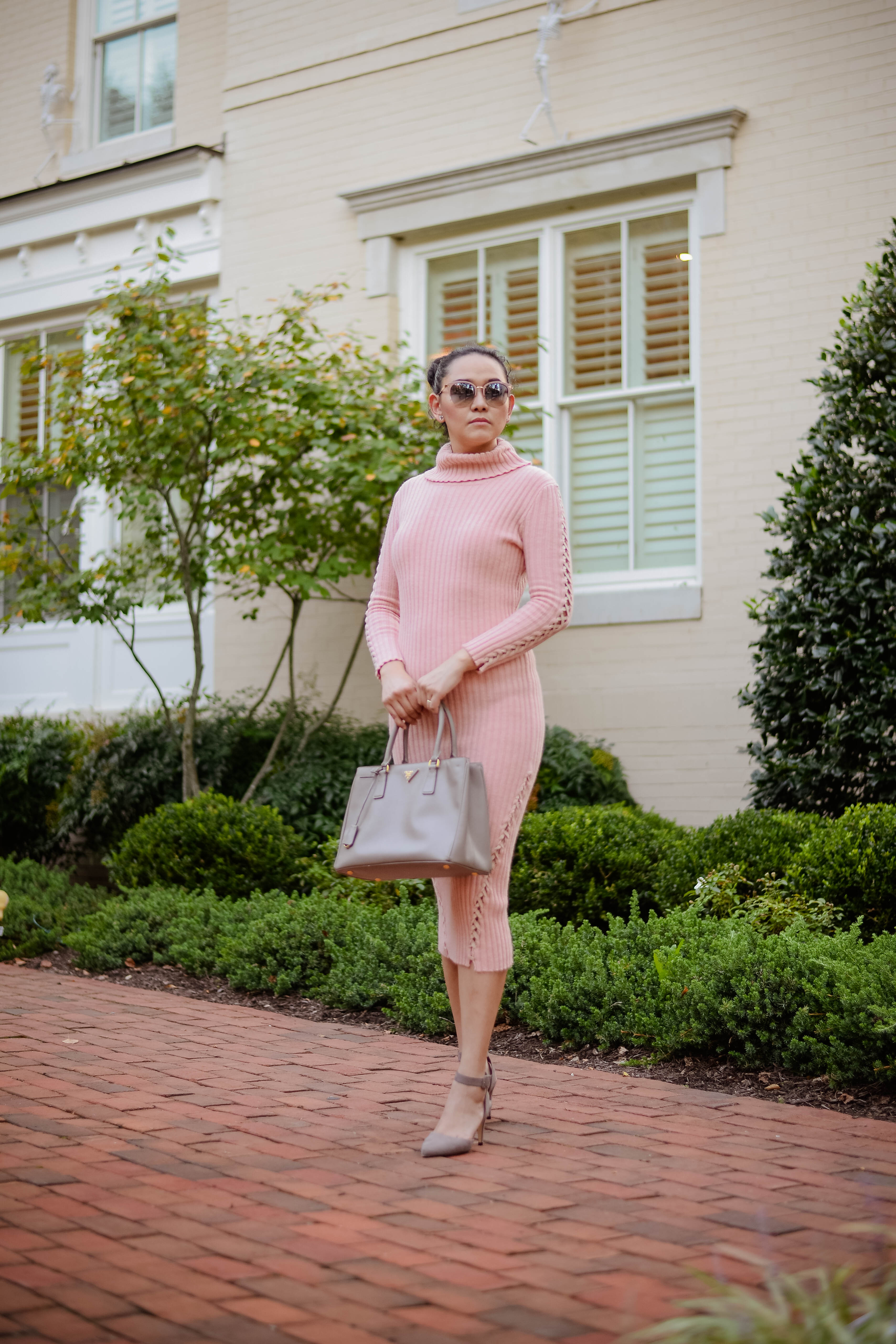 Wearing Pink Sweater Dress for Breast Cancer Awareness Month